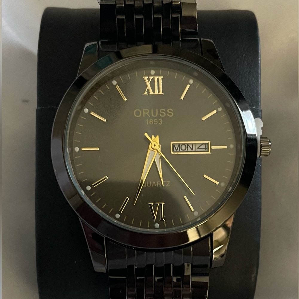 New ORUSS watch with metal adjustable band.